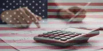Calculator with tax figures and US flag graphic, symbolizing federal tax code revisions for 2026.