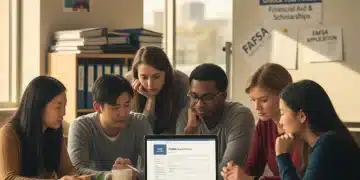 Diverse students reviewing FAFSA financial aid information on a laptop